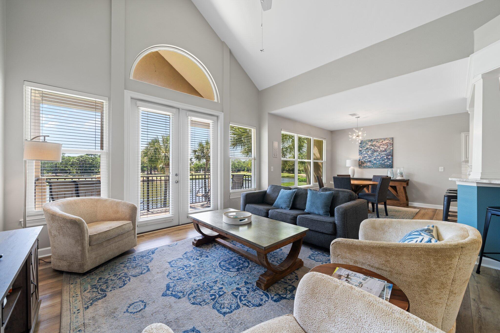 8512 Turnberry Court, Unit 8512 Miramar Beach, FL 32550 - Photo 18 of 35 a living room with furniture and a large window