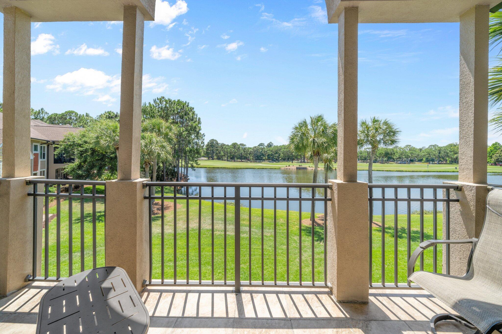 8512 Turnberry Court, Unit 8512 Miramar Beach, FL 32550 - Photo 2 of 35 a view of a porch with a floor to ceiling window