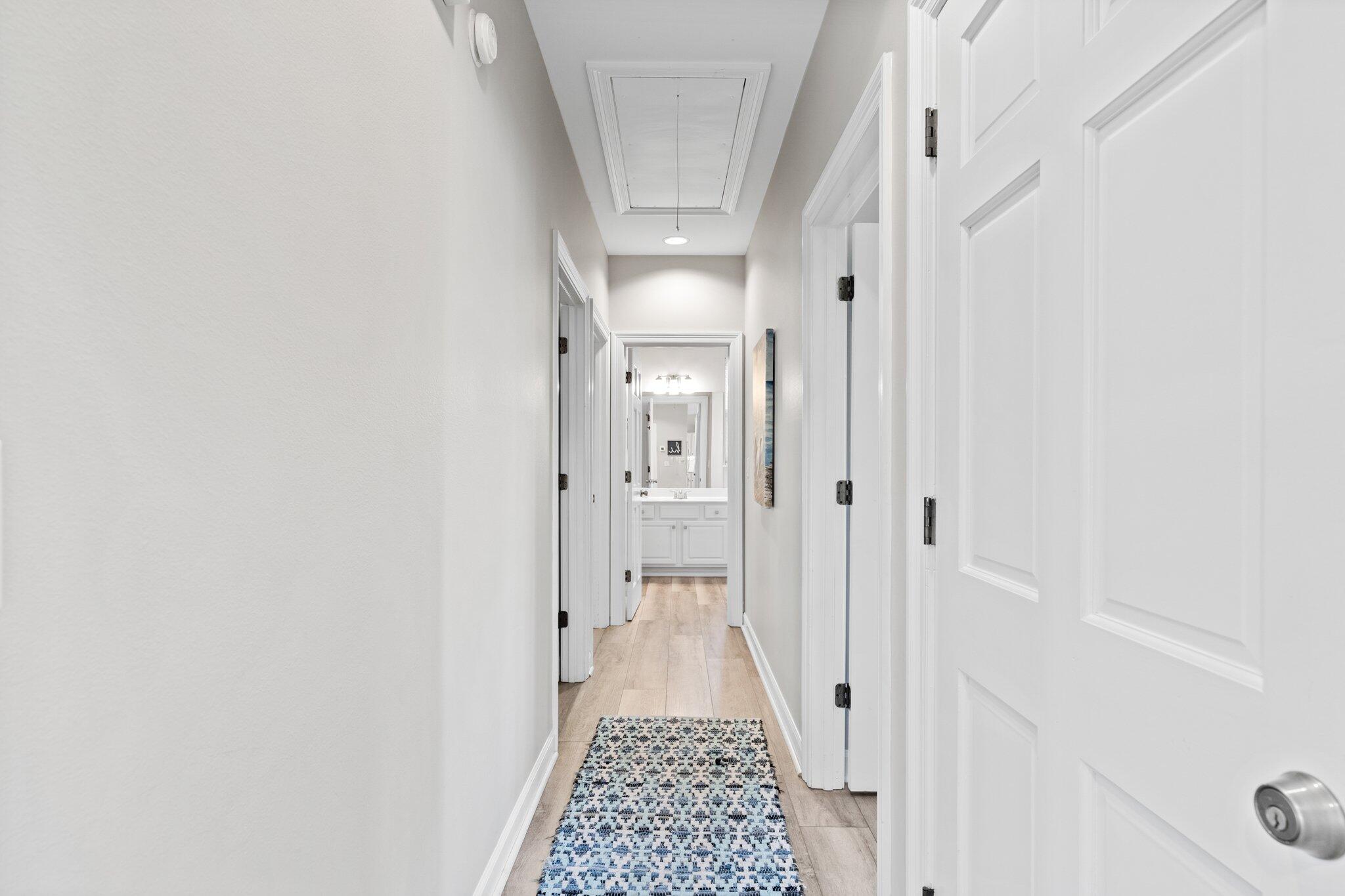 8512 Turnberry Court, Unit 8512 Miramar Beach, FL 32550 - Photo 23 of 35 a view of a hallway with a white walls