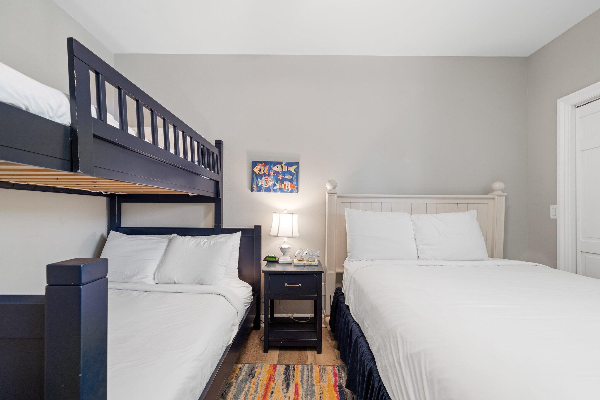 8512 Turnberry Court, Unit 8512 Miramar Beach, FL 32550 - Photo 30 of 35 a bedroom with a bed and a night stand