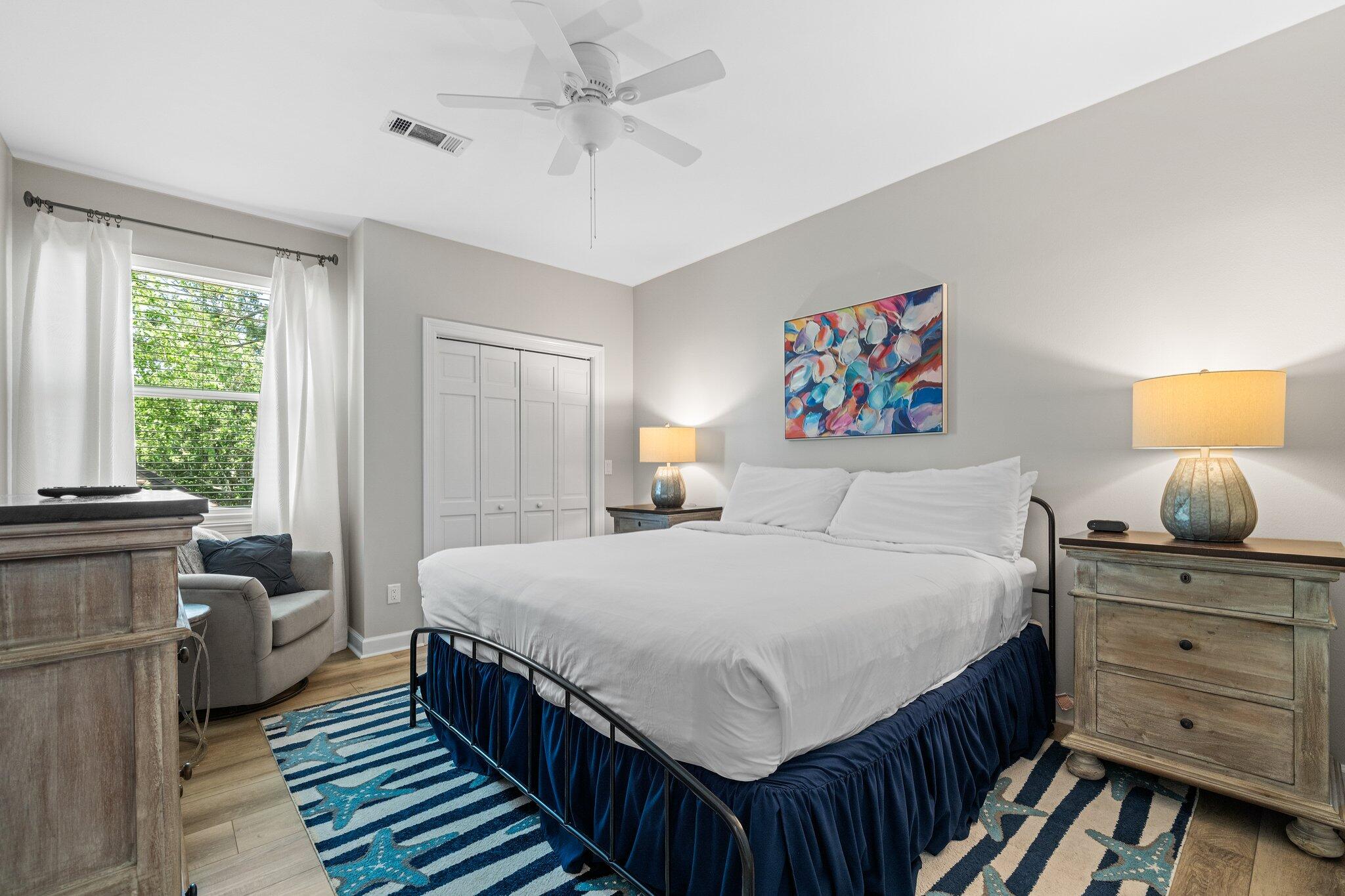 8512 Turnberry Court, Unit 8512 Miramar Beach, FL 32550 - Photo 32 of 35 a bedroom with a bed and a dresser