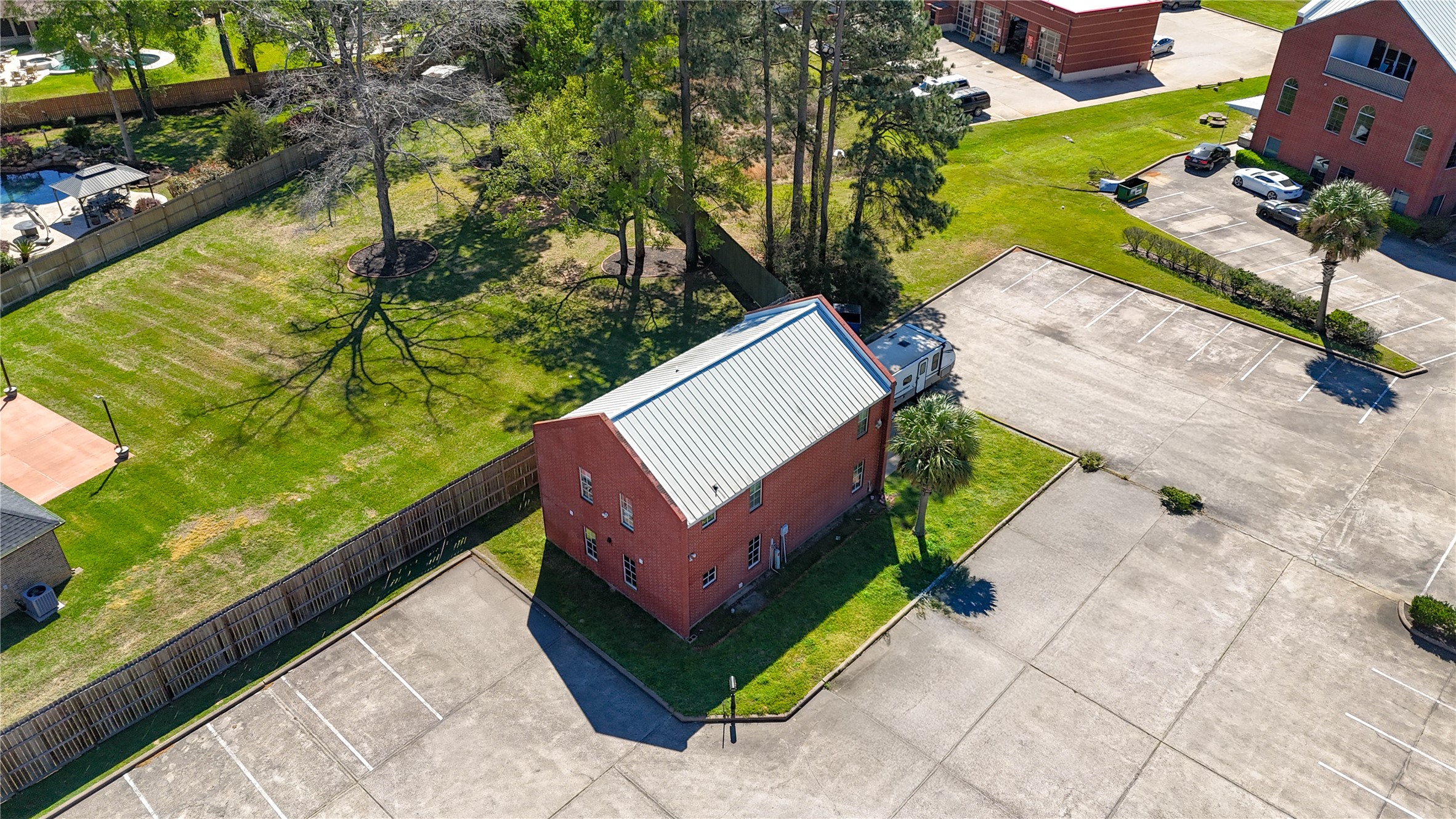 90 Beach Walk Boulevard Conroe, TX 77304 - Photo 16 of 26 a view of a bench in a yard