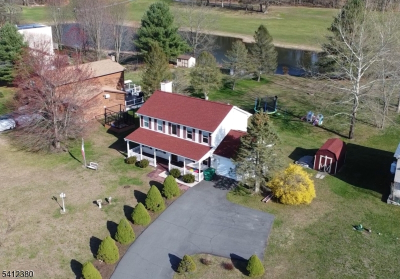 101 Racetrack Circle Montague, NJ 07827 - Photo 2 of 29 an aerial view of a house with garden space and street view