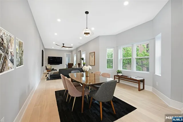 a view of a dining room with furniture window and outside view