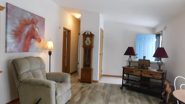 a kitchen with sink a stove and cabinets