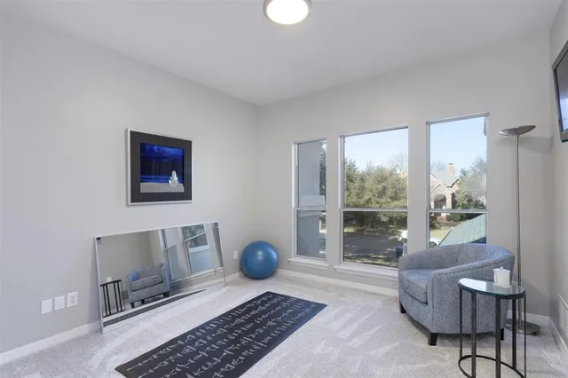 a bathroom with a toilet and a sink