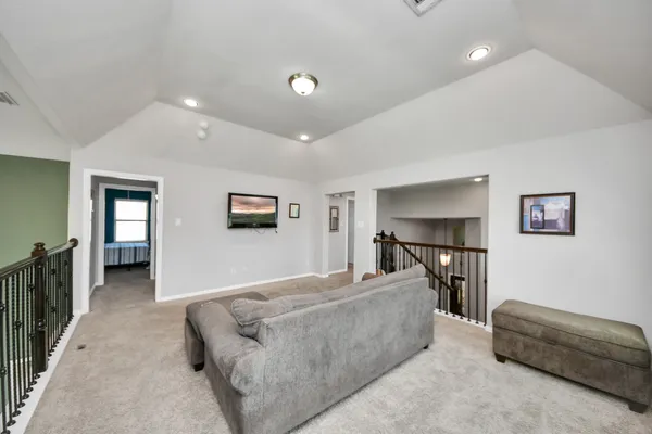 a living room with furniture and a couch