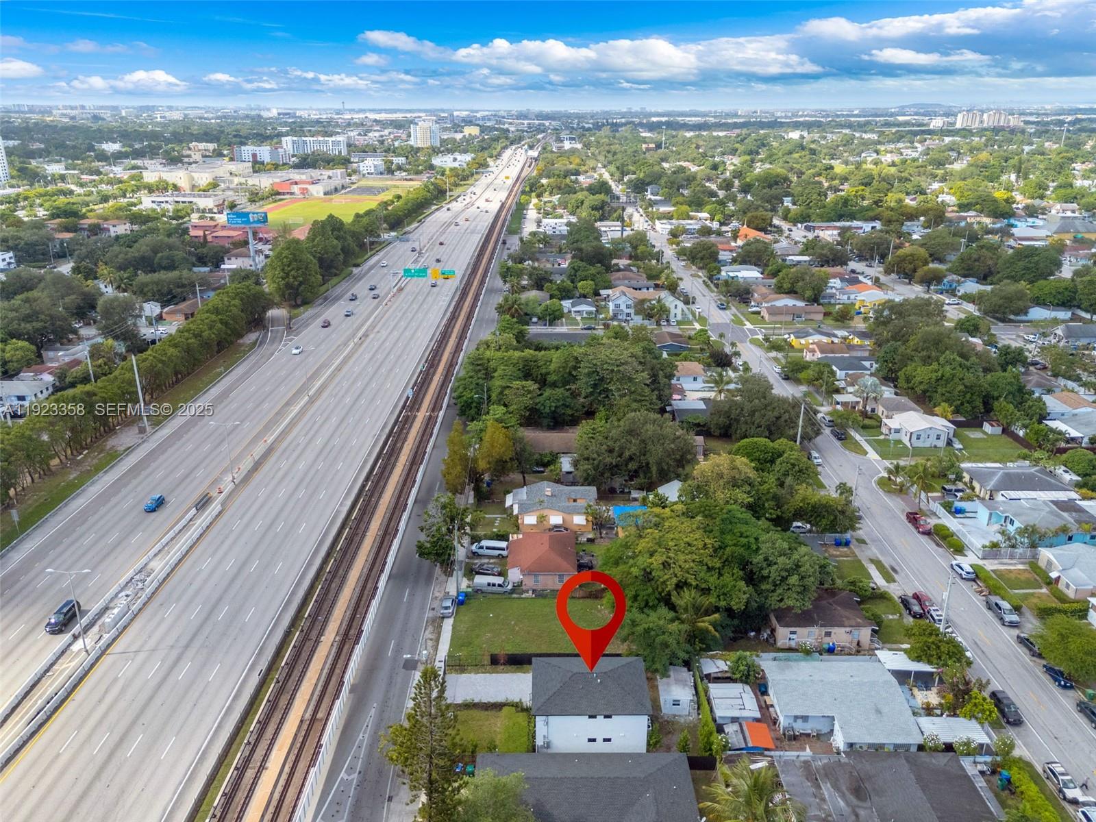 1413 Northwest 40th Street Miami, FL 33142 - Photo 25 of 30 a view of a city and mountains