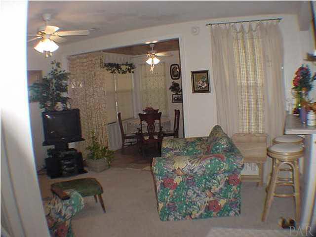 305 Frisco Road Pensacola, FL 32507 - Photo 14 of 15 Look into your dining room from your amazing living room.