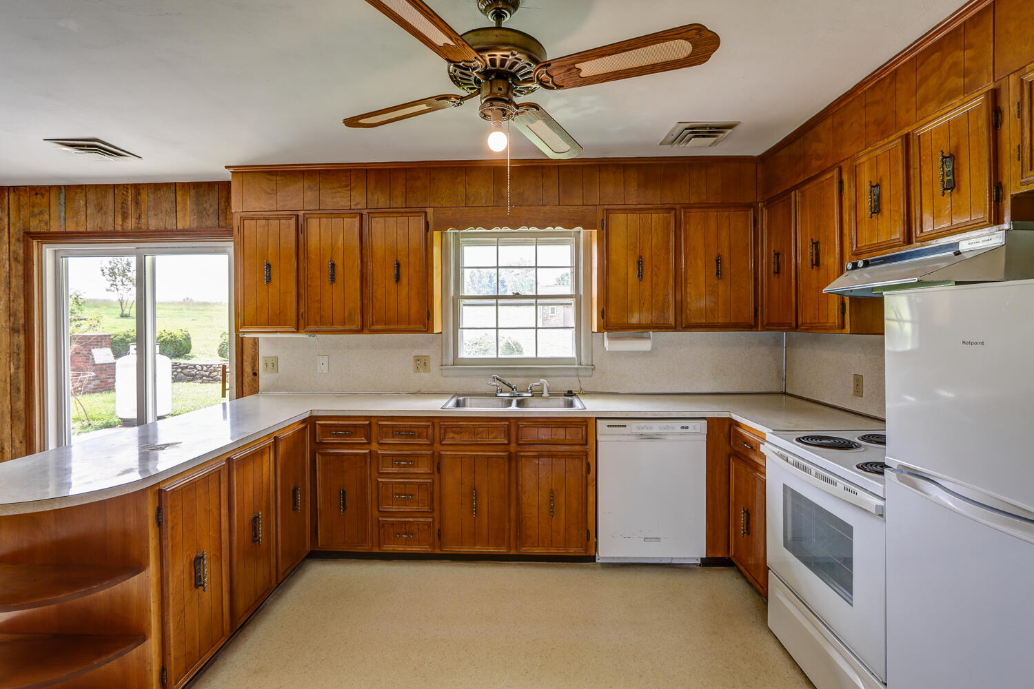 2231 Hardy Road Vinton, VA 24179 - Photo 14 of 40 a kitchen with stainless steel appliances granite countertop a sink a stove and a refrigerator