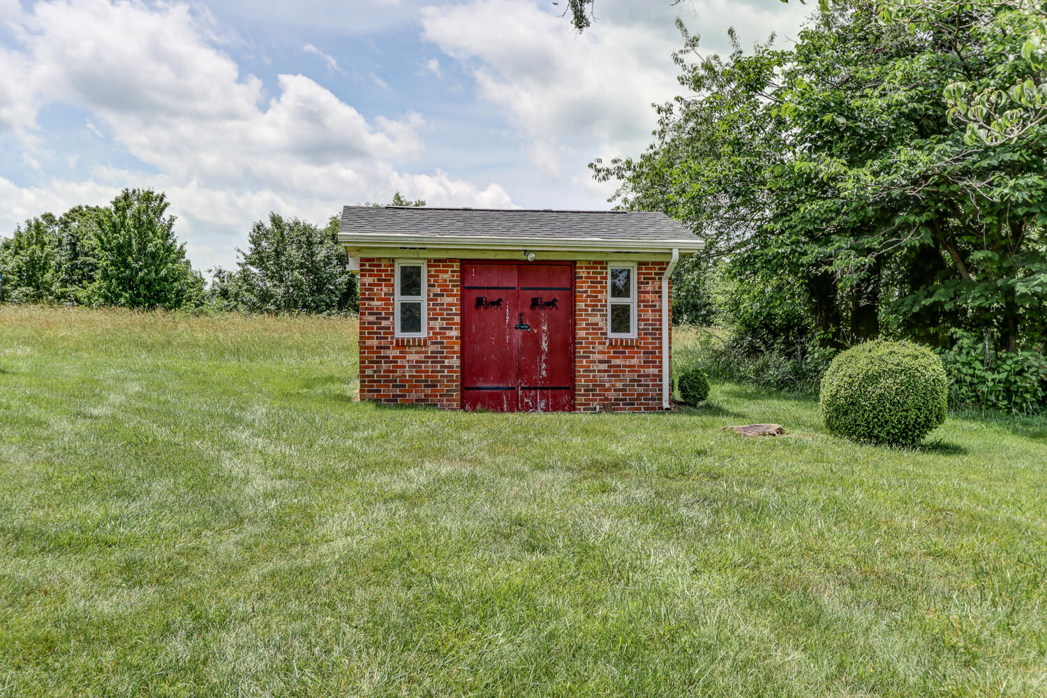 2231 Hardy Road Vinton, VA 24179 - Photo 32 of 40 a view of a barn in the middle of a yard