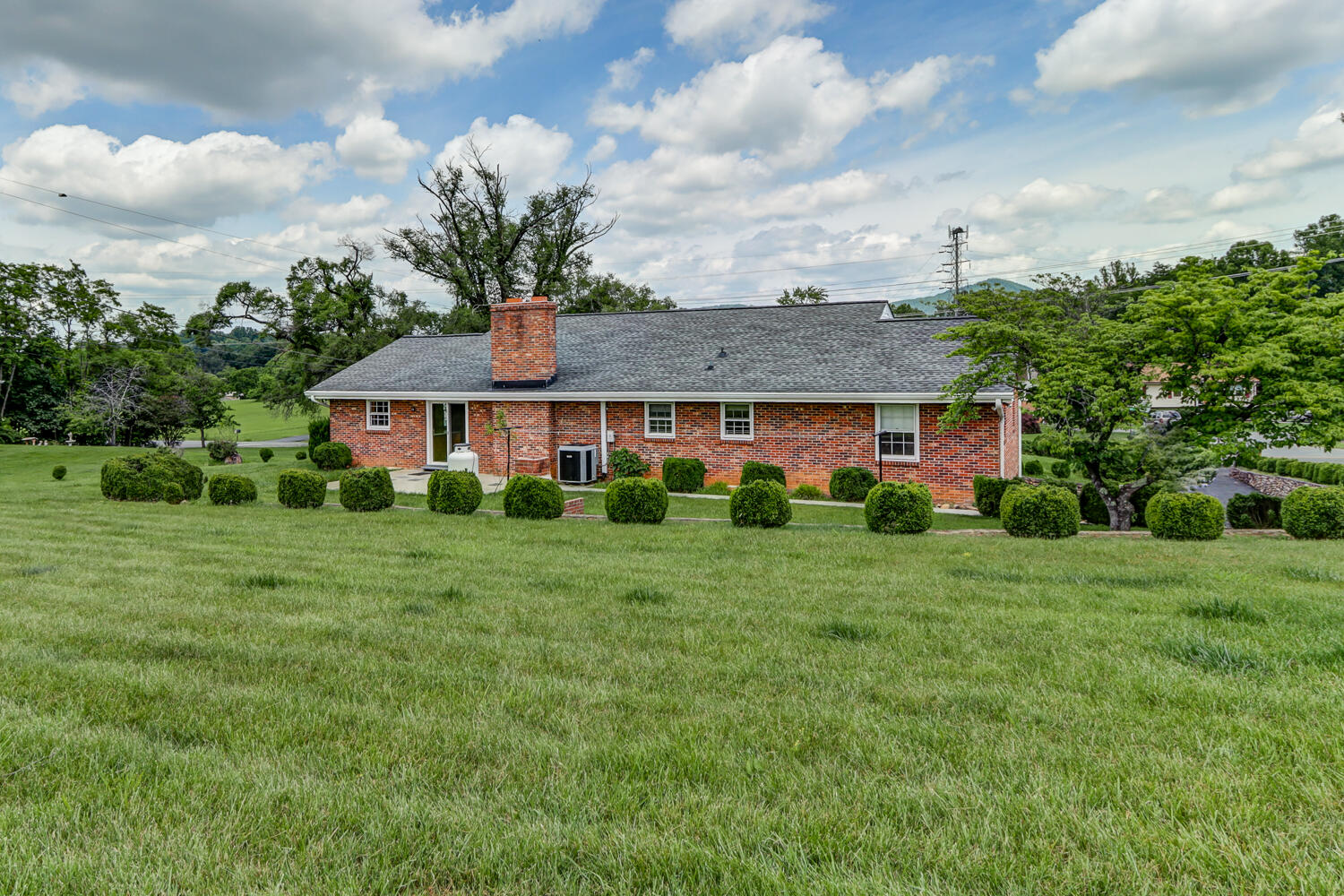2231 Hardy Road Vinton, VA 24179 - Photo 33 of 40 a front view of a house with a yard