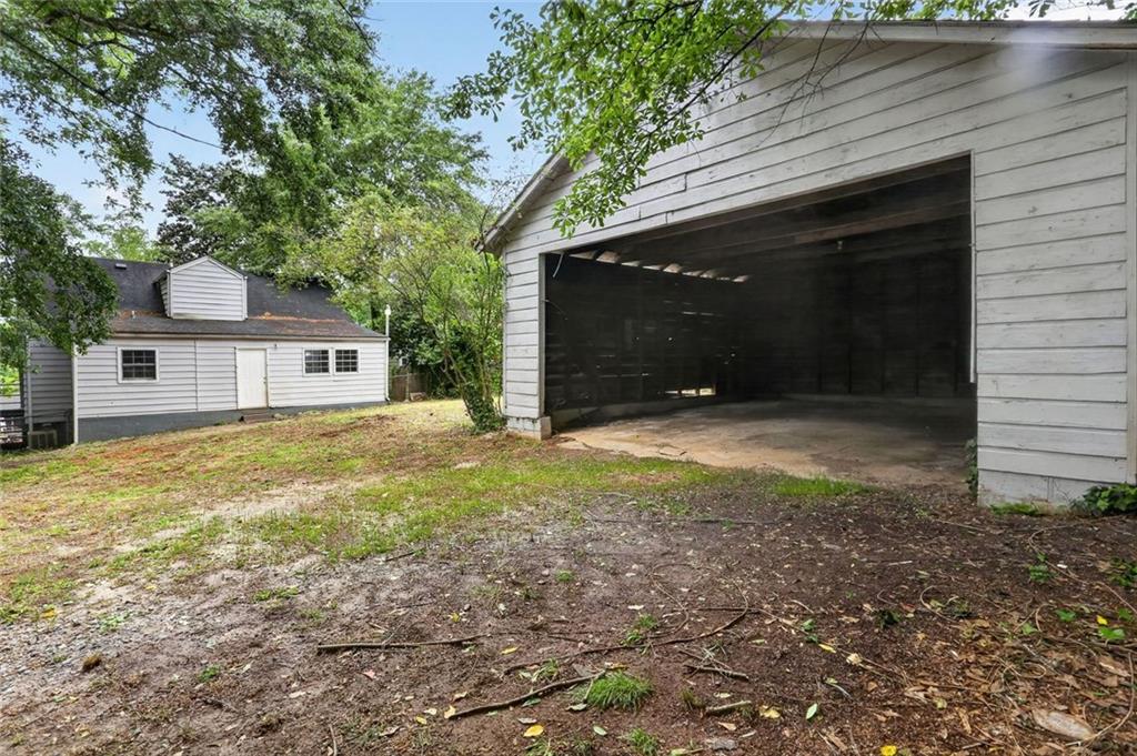 2728 Winburn Terrace Atlanta, GA 30344 - Photo 15 of 16 a front view of a house with a yard