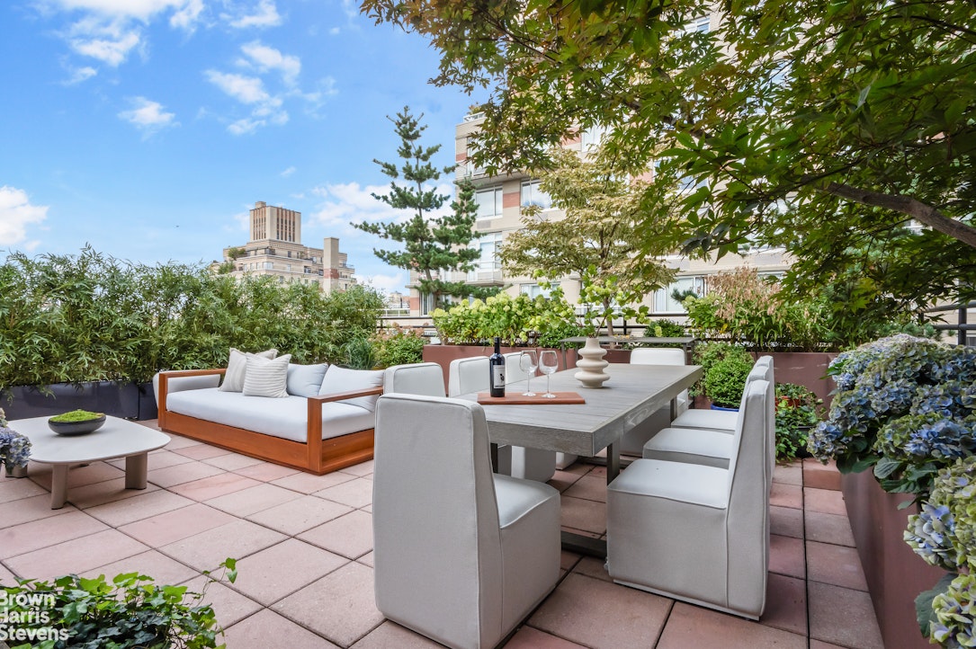 257 West 86th Street, Unit PHA Manhattan, NY 10024 - Photo 16 of 17 a view of a patio with couches and potted plants