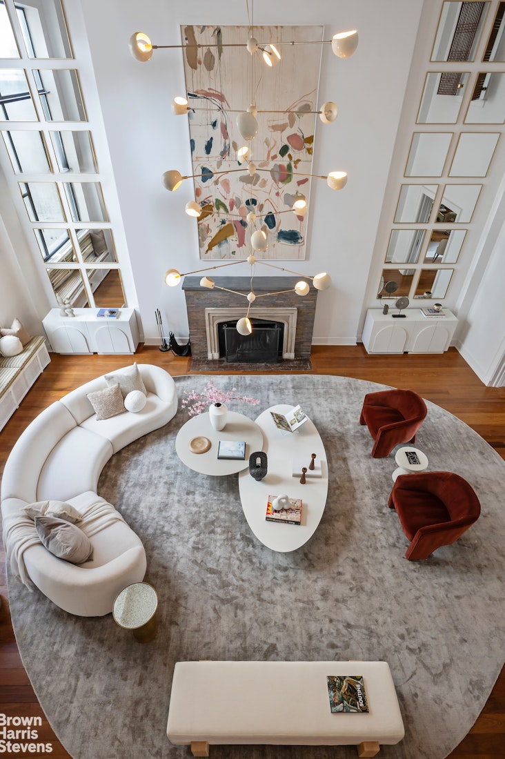 257 West 86th Street, Unit PHA Manhattan, NY 10024 - Photo 2 of 17 a living room with furniture and decor