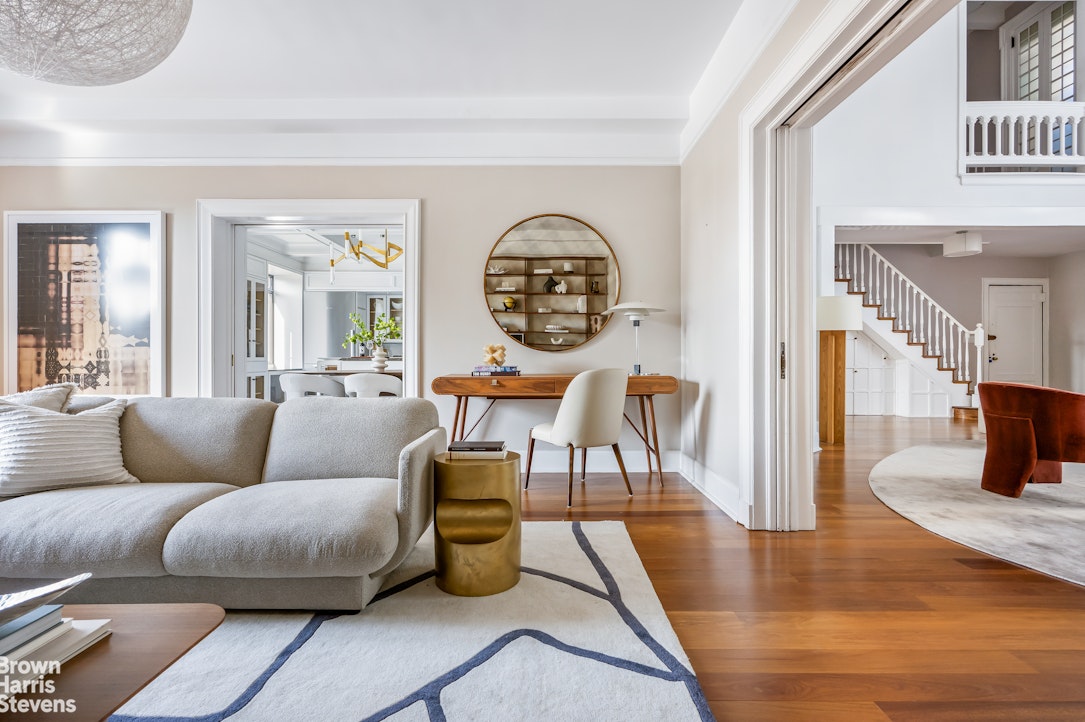 257 West 86th Street, Unit PHA Manhattan, NY 10024 - Photo 8 of 17 a living room with furniture a bathtub and a potted plant