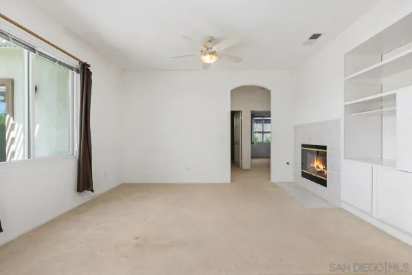an empty room with a bathroom
