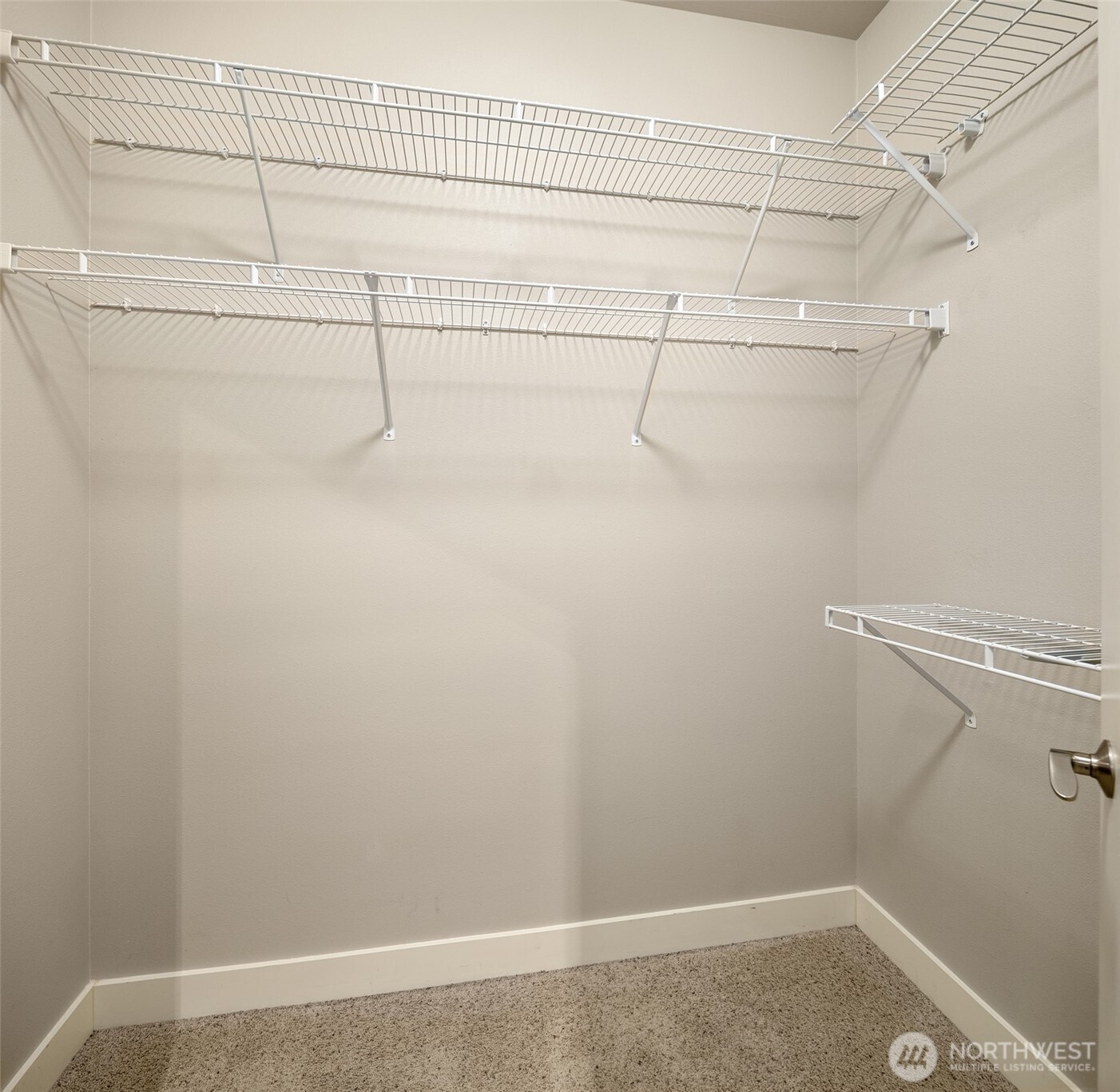 15700 116th Avenue Northeast, Unit 404 Bothell, WA 98011 - Photo 25 of 31 a view of a room with racks on the wall