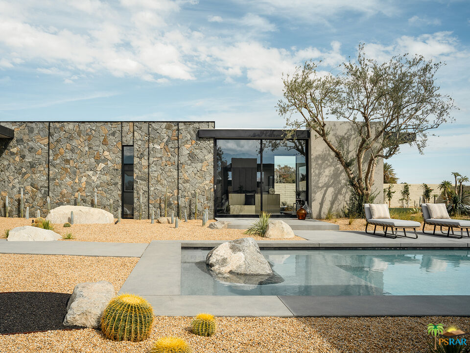 5 Echo Lane Rancho Mirage, CA 92270 - Photo 5 of 24 a view of a house with swimming pool and sitting area