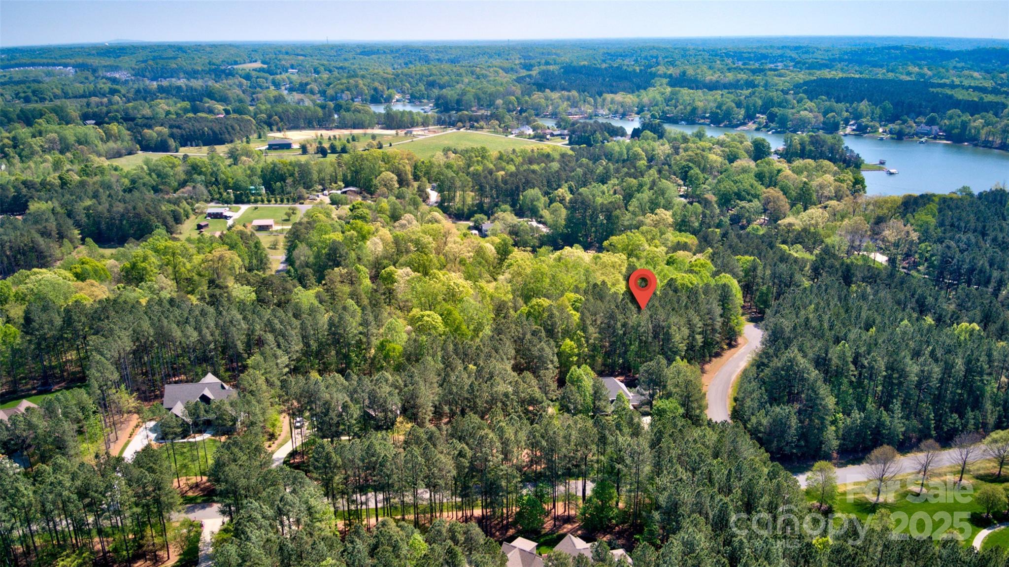111 Cinder Ridge Court Troutman, NC 28166 - Photo 12 of 23 an aerial view of residential house with outdoor space and trees all around