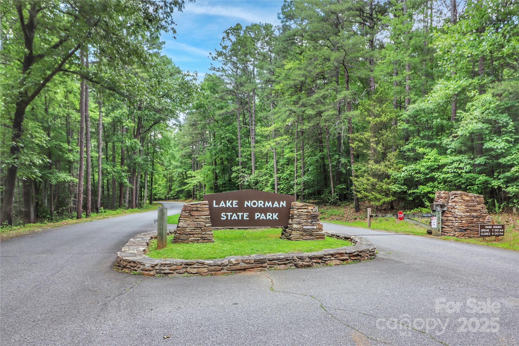 111 Cinder Ridge Court Troutman, NC 28166 - Photo 17 of 23 a view of a park with iron fence