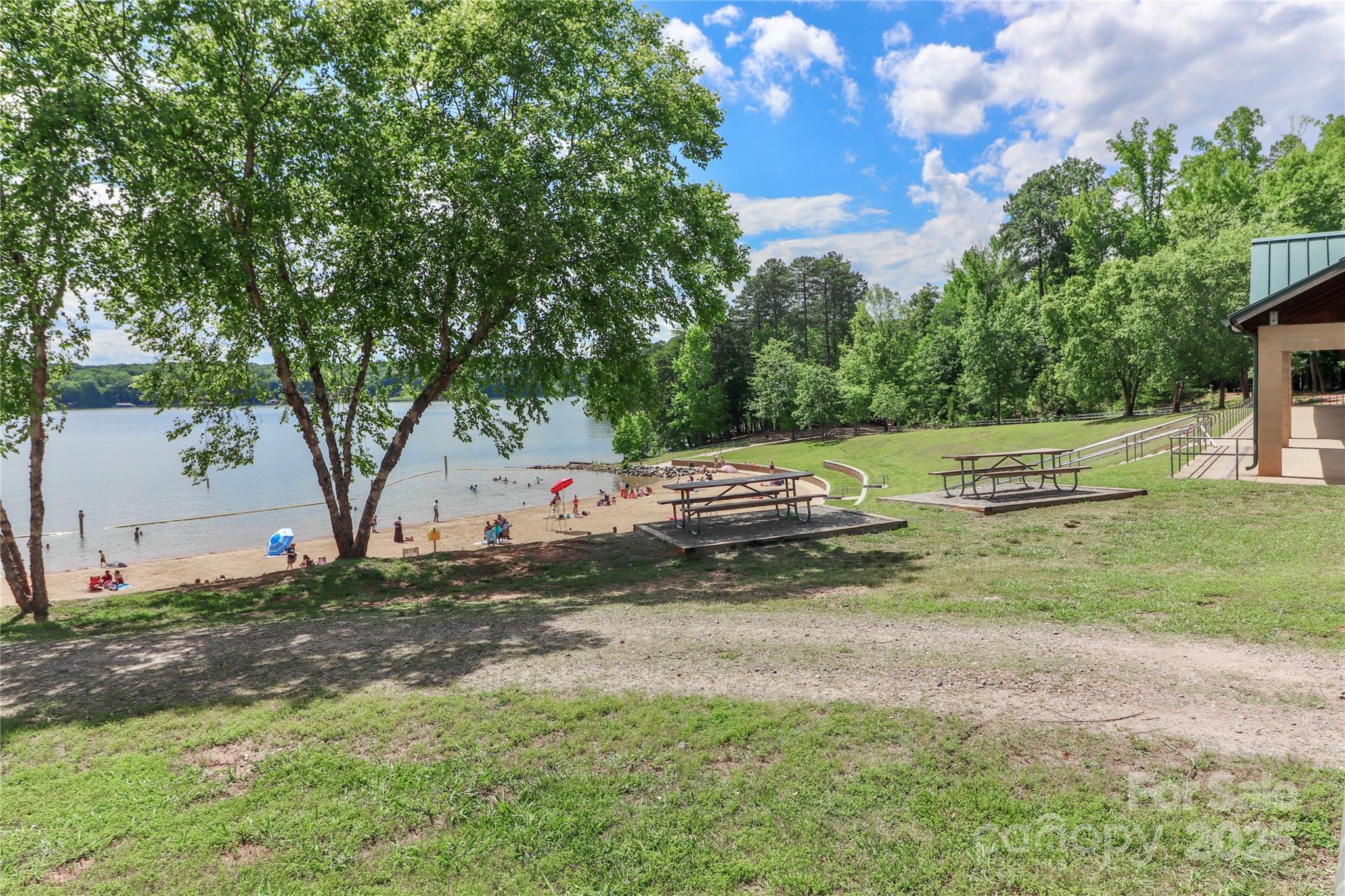 111 Cinder Ridge Court Troutman, NC 28166 - Photo 18 of 23 a backyard of a house with lots of green space