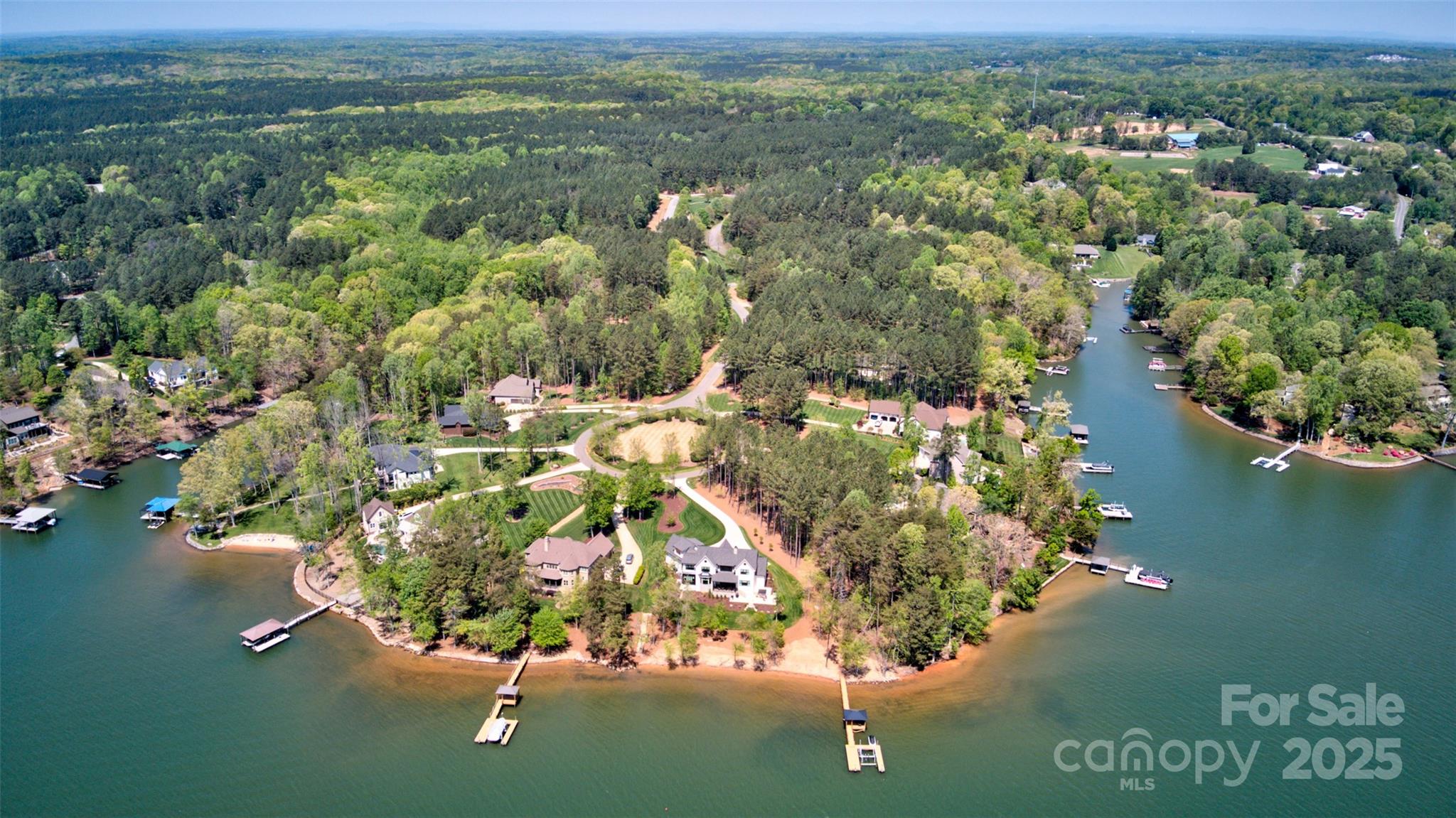 111 Cinder Ridge Court Troutman, NC 28166 - Photo 2 of 23 an aerial view of residential houses with outdoor space