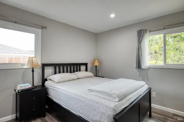 a living room with furniture and window