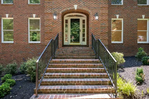 a front view of a house with windows