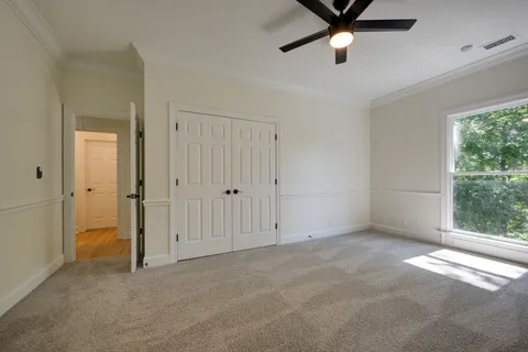 a view of wooden floor in an empty room