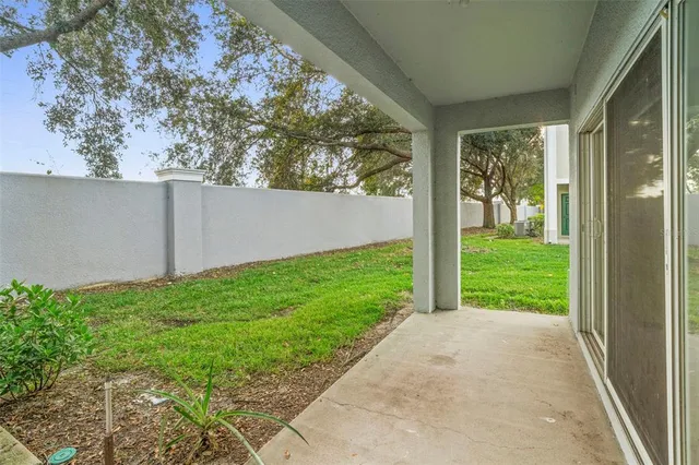 an aerial view of a house with a lake view