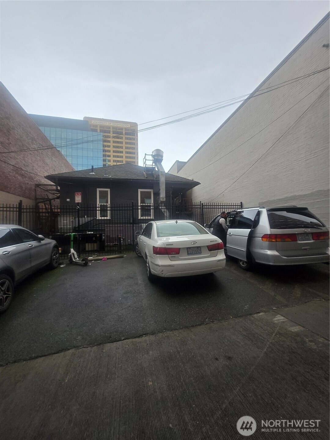 4332 University Way Northeast, Unit A Seattle, WA 98105 - Photo 3 of 20 a couple of cars parked in a parking lot