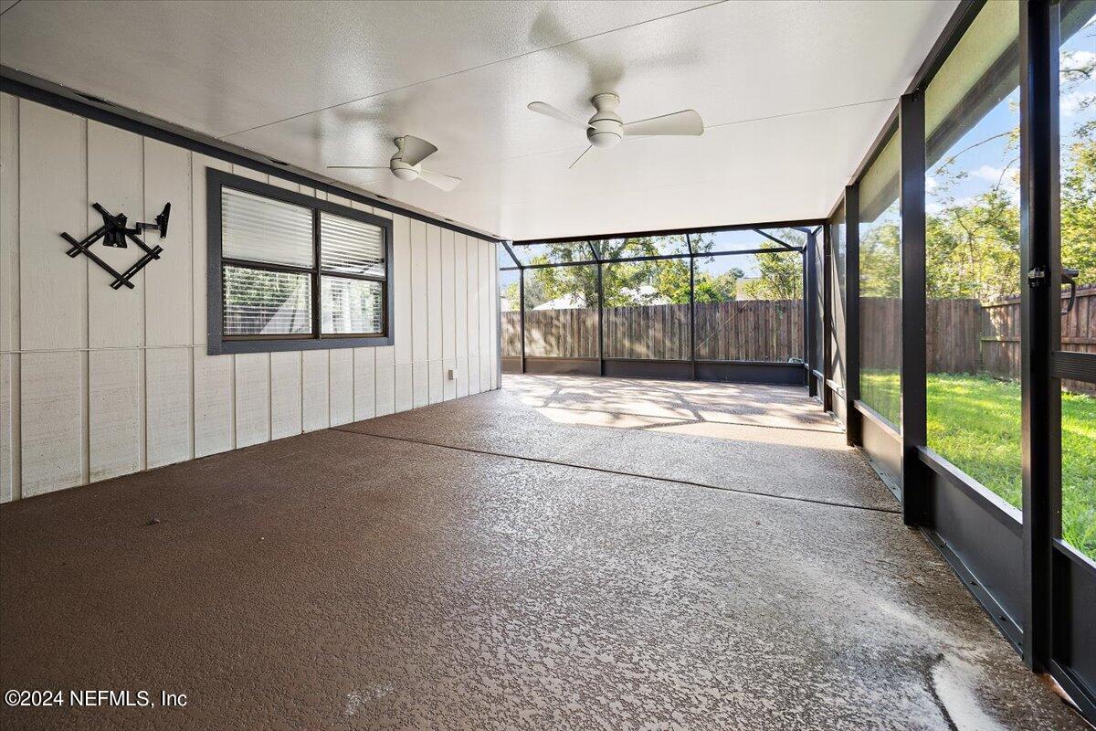 3176 Ricky Drive Jacksonville, FL 32223 - Photo 17 of 22 a view of an empty room with a window
