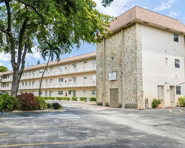 a view of a building with a street