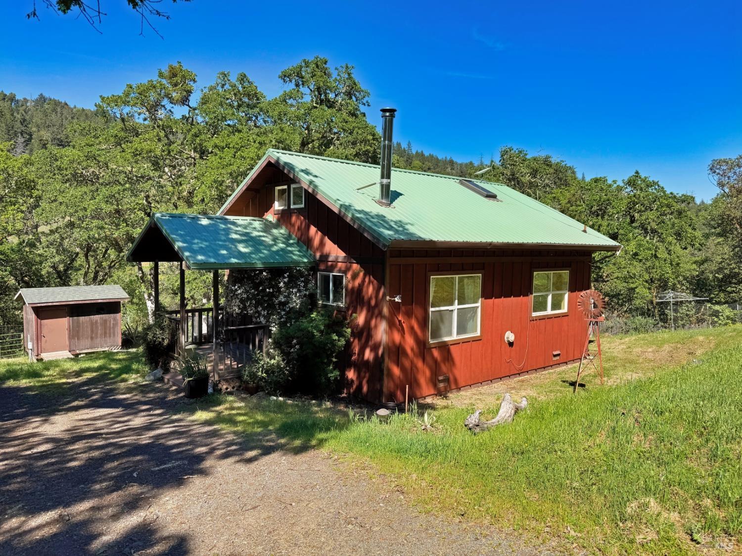 2501 Main Ranch Road Redwood Valley, CA 95470 - Photo 1 of 57 an outdoor sitting area with golf course