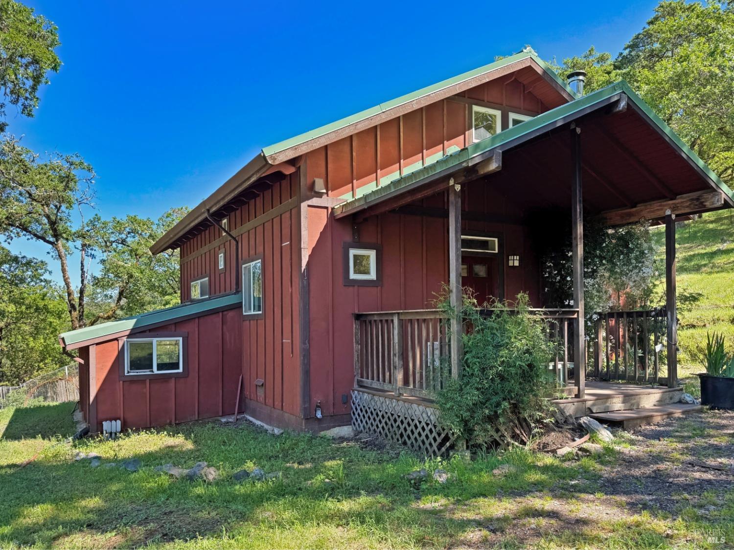 2501 Main Ranch Road Redwood Valley, CA 95470 - Photo 13 of 57 a front view of a house with garden