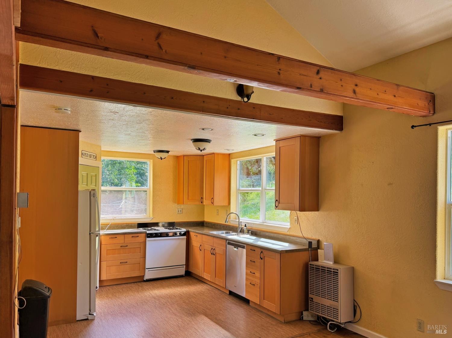 2501 Main Ranch Road Redwood Valley, CA 95470 - Photo 4 of 57 a kitchen with stainless steel appliances granite countertop a sink and a refrigerator