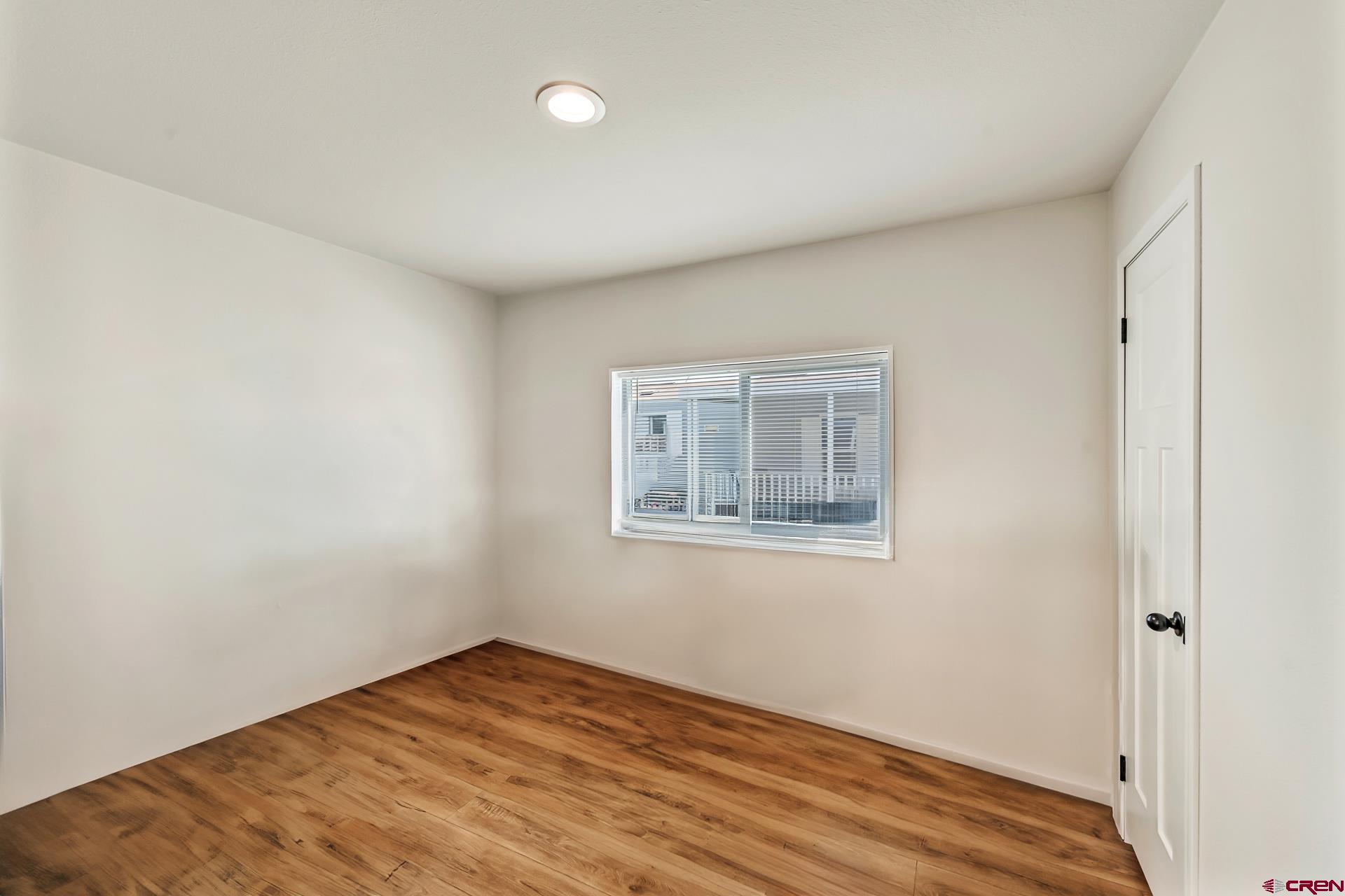 901 6530 Road, Unit 3007 Montrose, CO 81401 - Photo 24 of 33 a view of an empty room with a window