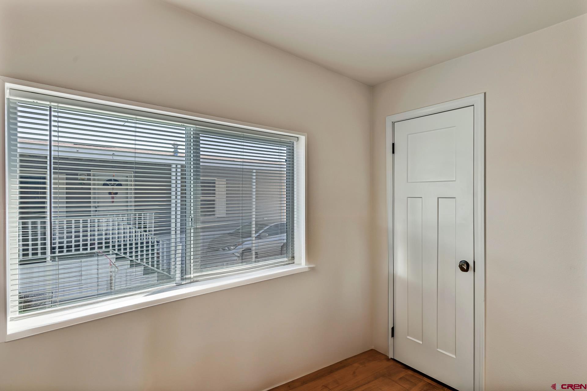 901 6530 Road, Unit 3007 Montrose, CO 81401 - Photo 25 of 33 a view of an empty room with a window