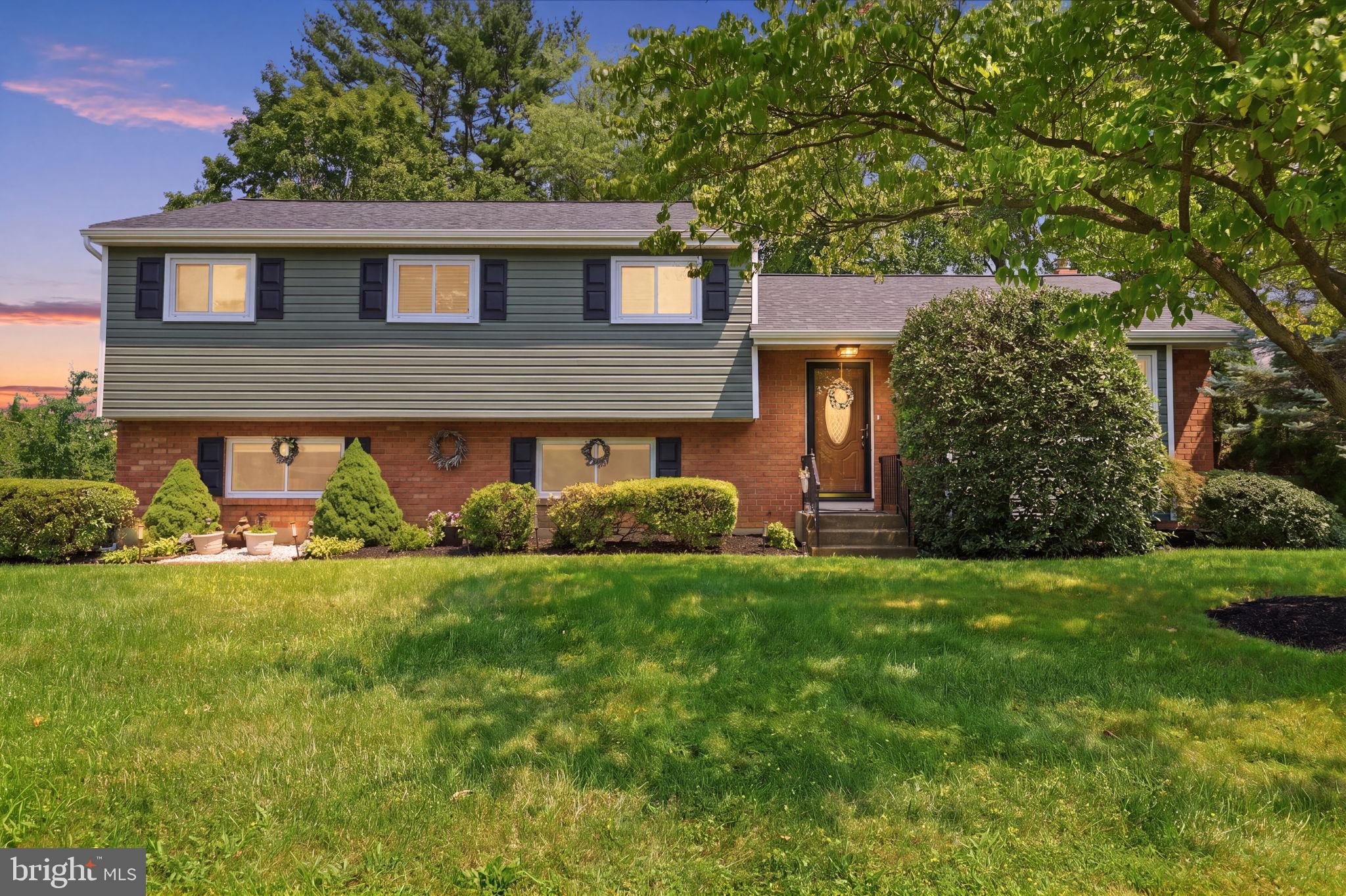 Charming home with lush greenery.