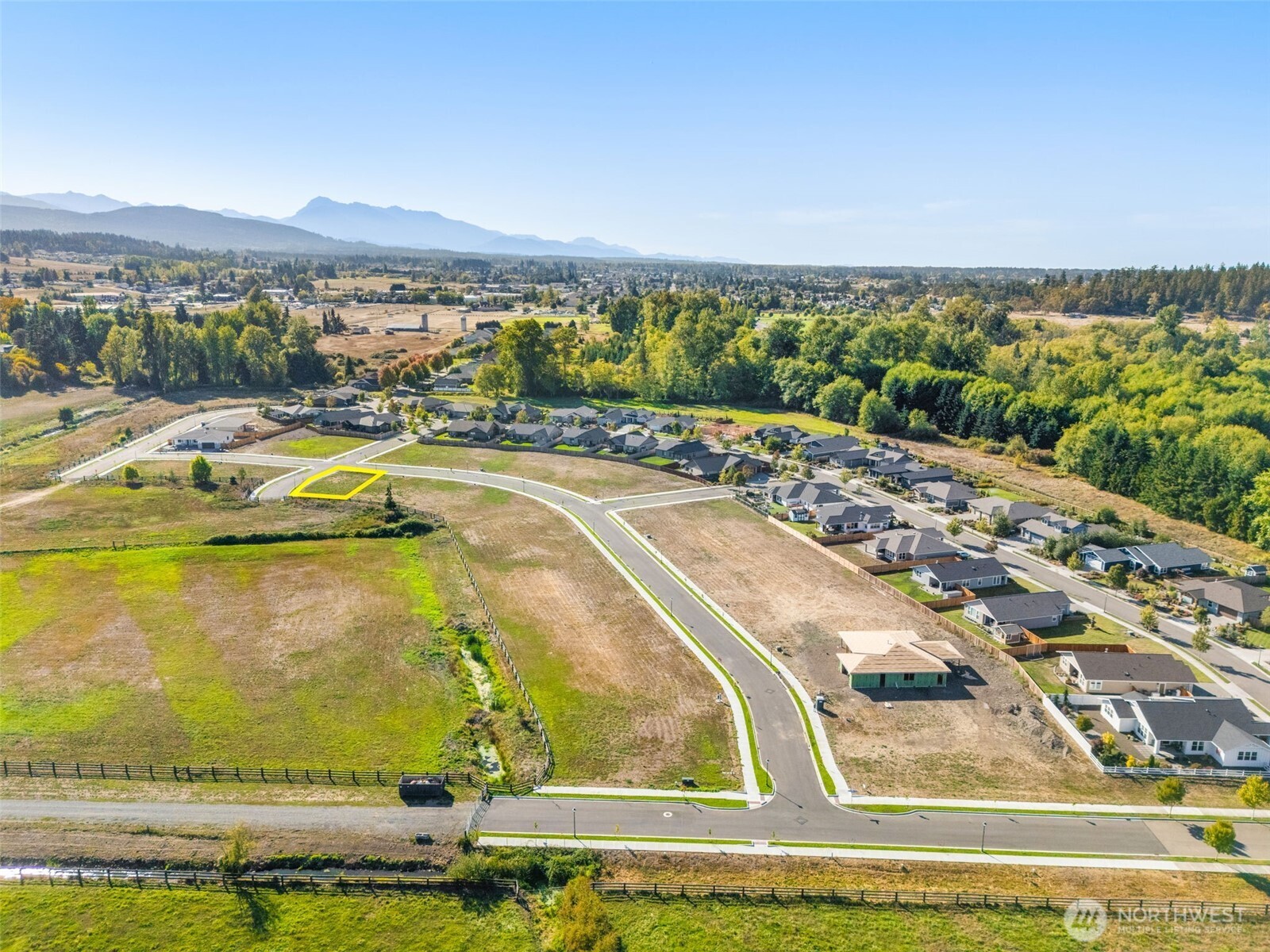 51 Colchester Street Sequim, WA 98382 - Photo 13 of 26 a view of a swimming pool with an ocean view
