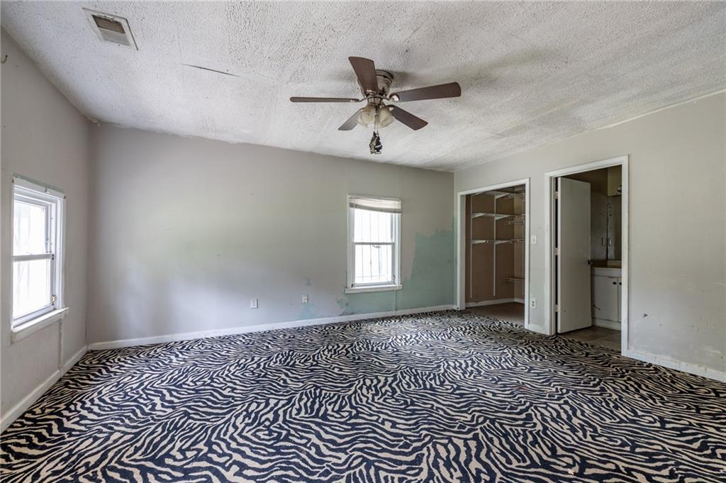 3838 Old Gordon Road Northwest Atlanta, GA 30336 - Photo 13 of 23 a view of empty room with window and ceiling fan
