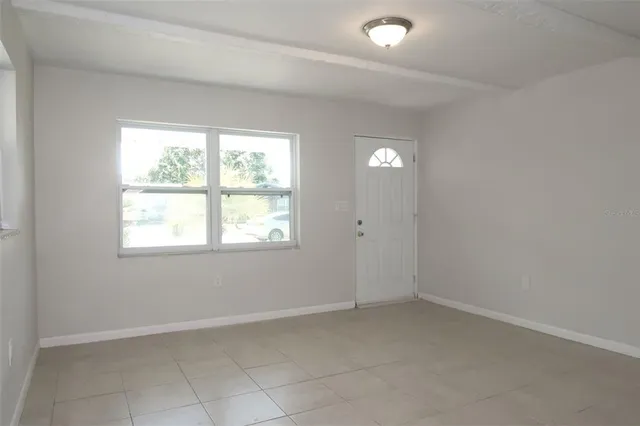 an empty room with a window