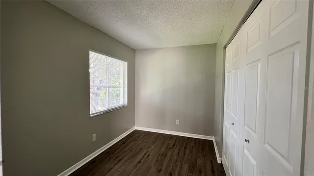 a bathroom with a sink a mirror a toilet and a mirror