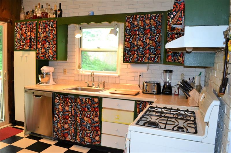 408 Cascade Road Pittsburgh, PA 15221 - Photo 13 of 25 KITCHEN/SELLER UPDATES: Dishwasher installed 2018, garbage disposal installed 2014, refrigerator installed 2013, glass sliding doors installed 2012. SEE ATTACHED LIST FOR ALL UPDATES AND IMPROVEMENTS DONE BY CURRENT SELLERS