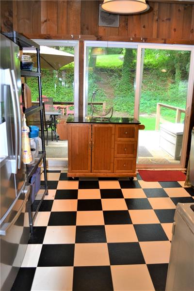 408 Cascade Road Pittsburgh, PA 15221 - Photo 15 of 25 KITCHEN: The glass sliding doors (2012) lead to the inviting outdoor deck (2010)