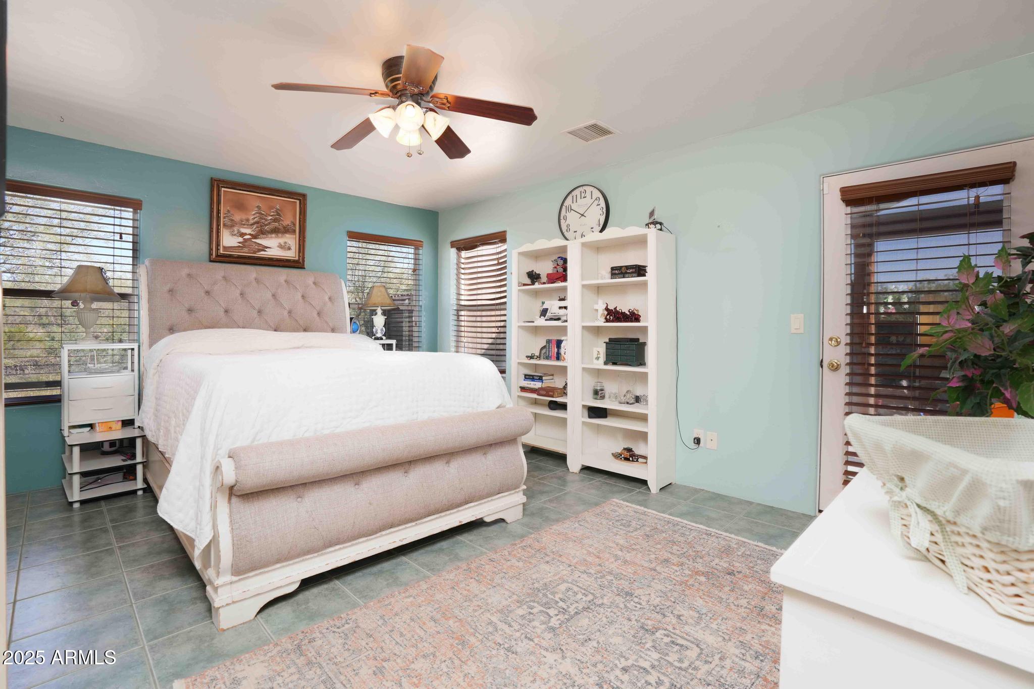 5775 North Kramer Drive Rimrock, AZ 86335 - Photo 13 of 33 a bed room with a bed and a chair