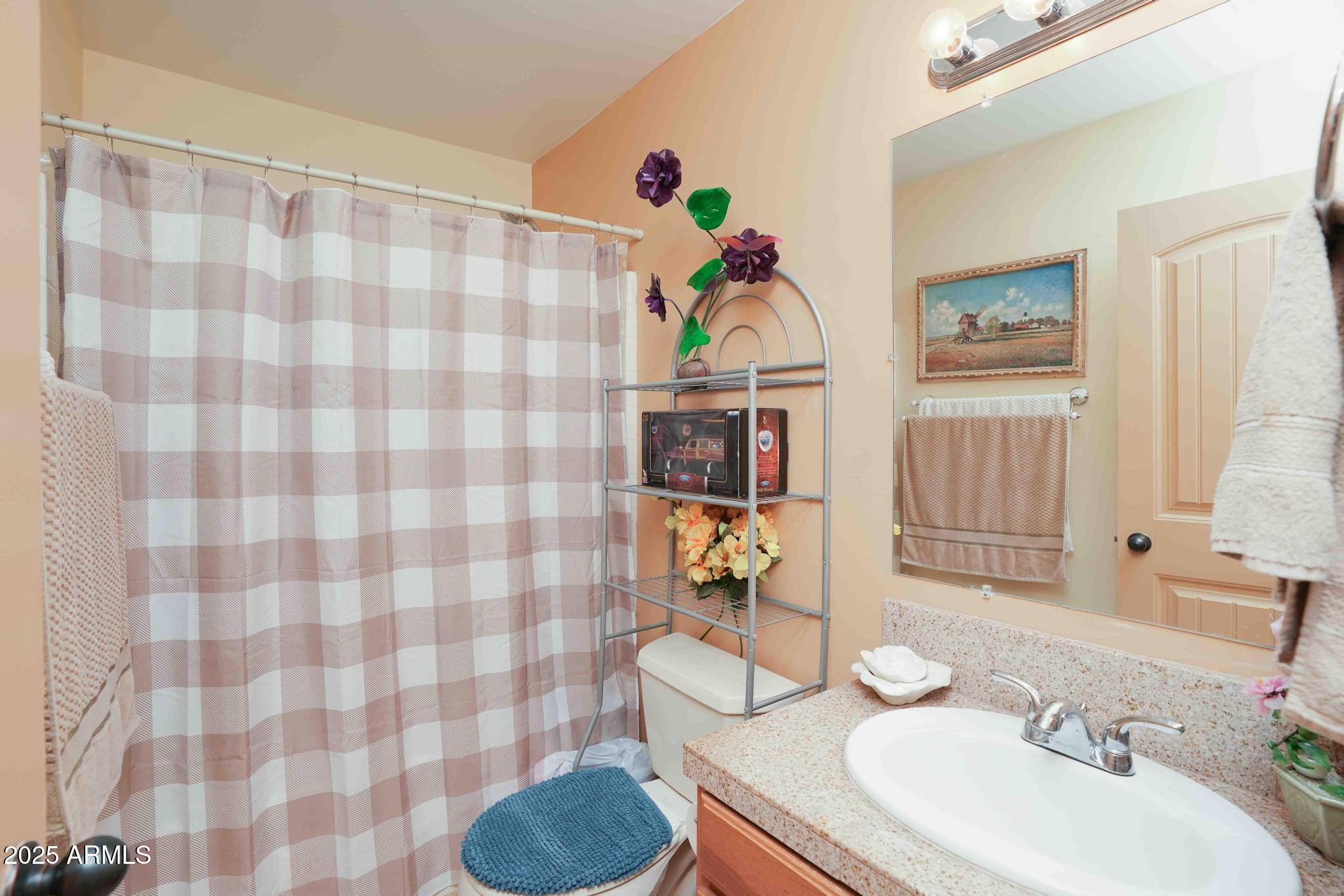 5775 North Kramer Drive Rimrock, AZ 86335 - Photo 21 of 33 a bathroom with a sink toilet and shower