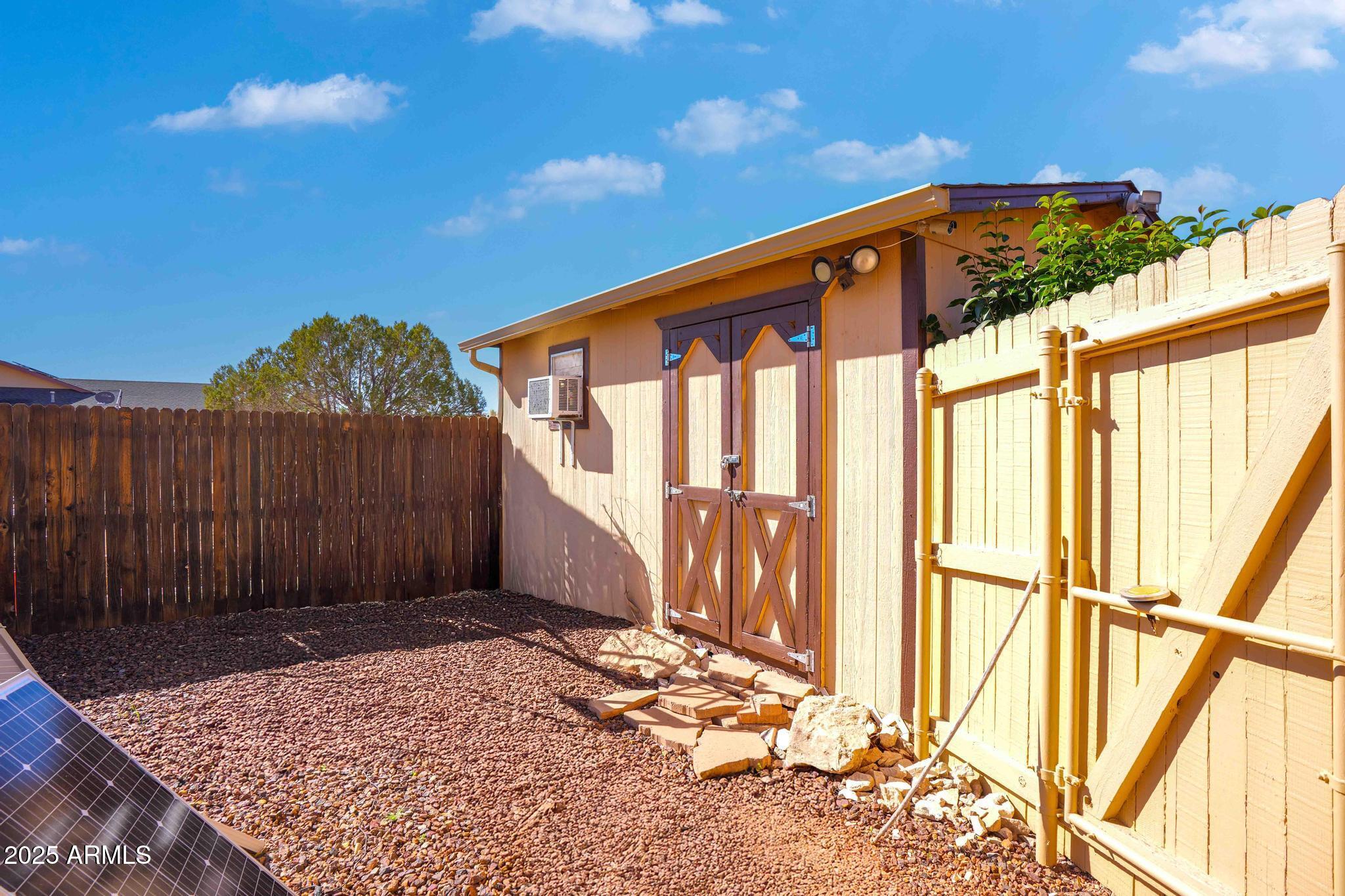 5775 North Kramer Drive Rimrock, AZ 86335 - Photo 31 of 33 a front view of a house with a yard