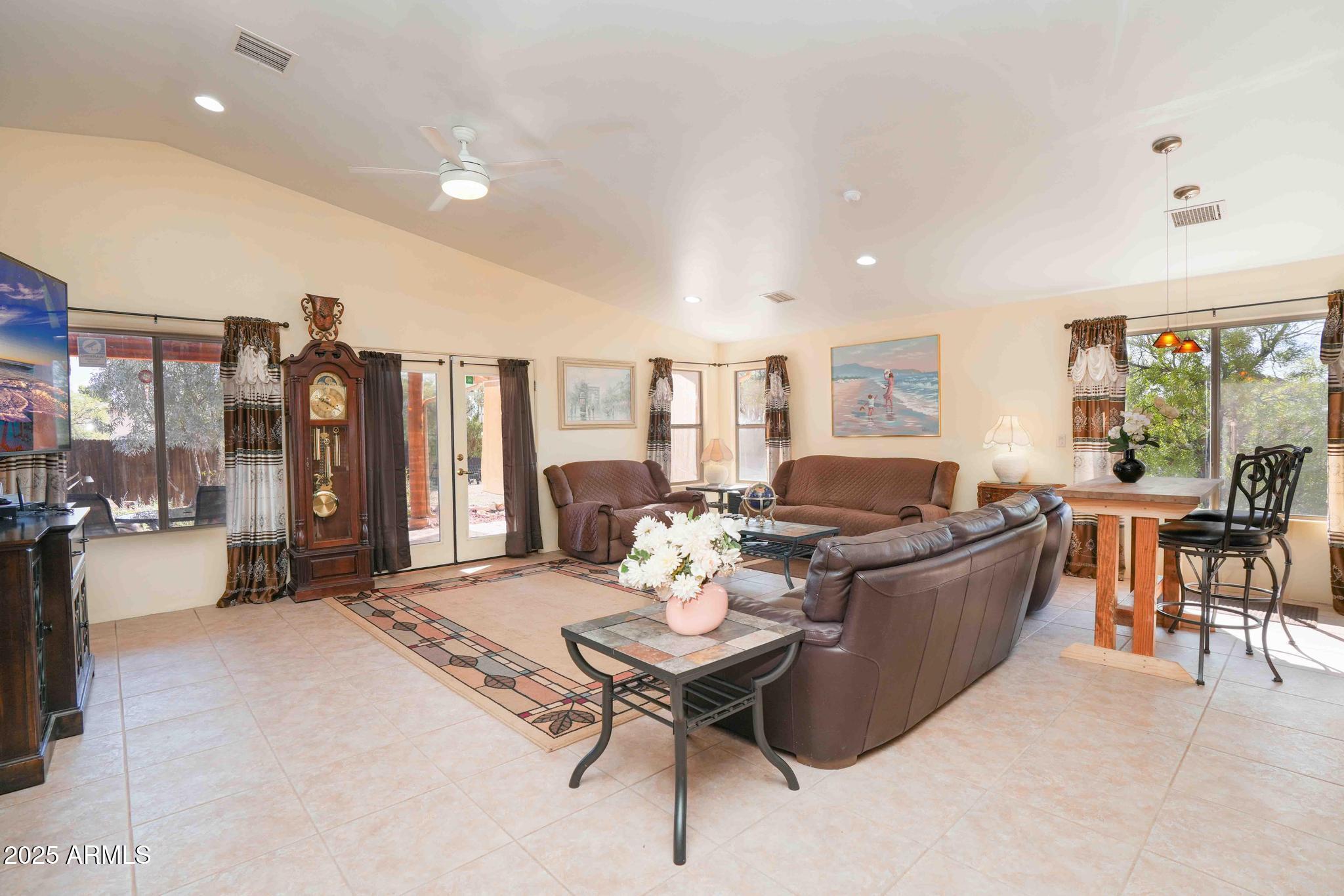 5775 North Kramer Drive Rimrock, AZ 86335 - Photo 4 of 33 a living room with furniture two window and a table